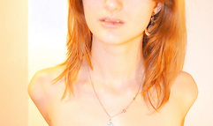 Redhead babe showing her tits